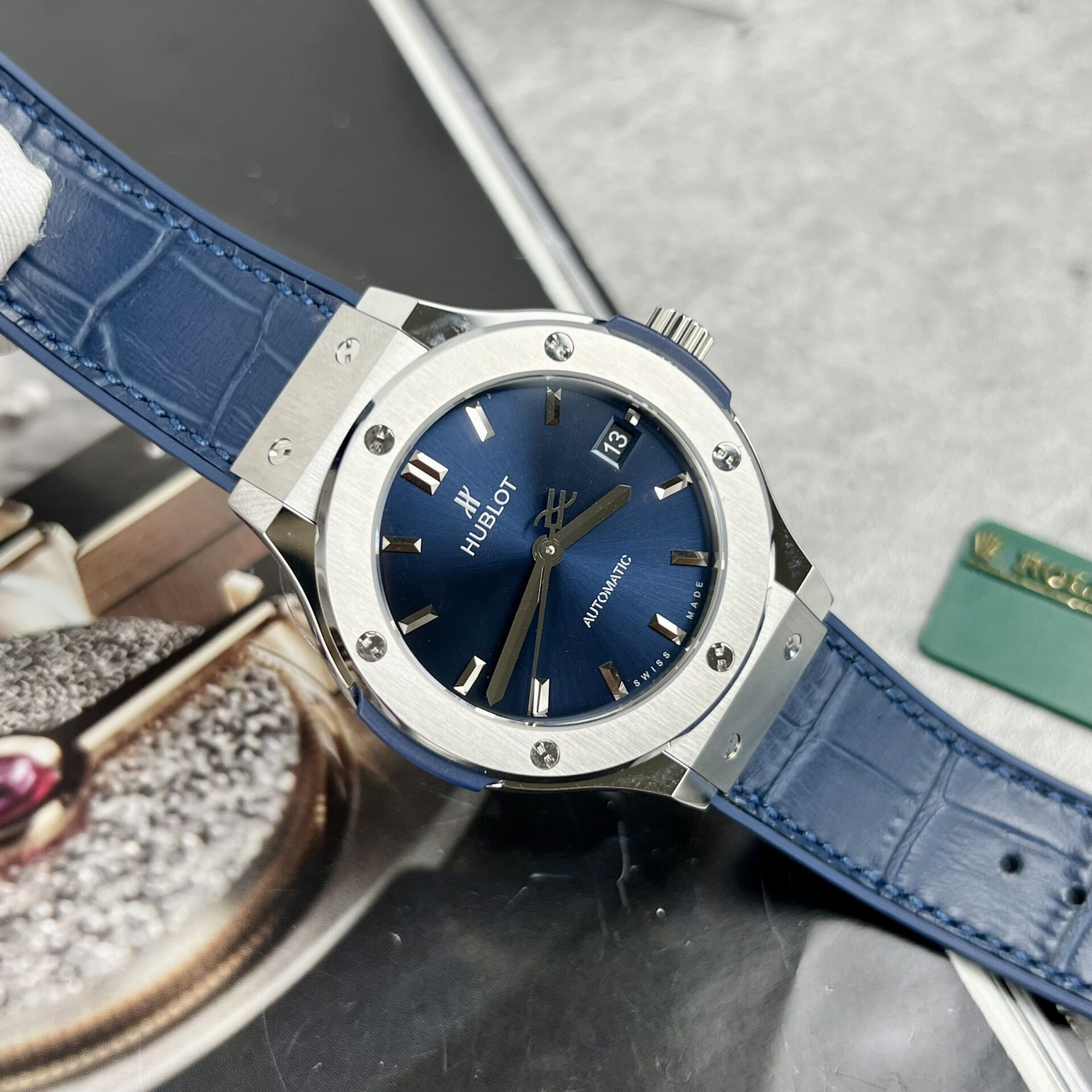 Dong-Ho-Hublot-Classic-Fusion-Titanium-Replica-11-Mau-Xanh-Duong-JJF-38mm-6.jpg Hublot Classic Fusion Titanium Replica Watch Blue Leather Strap JJF 38mm - Image 1