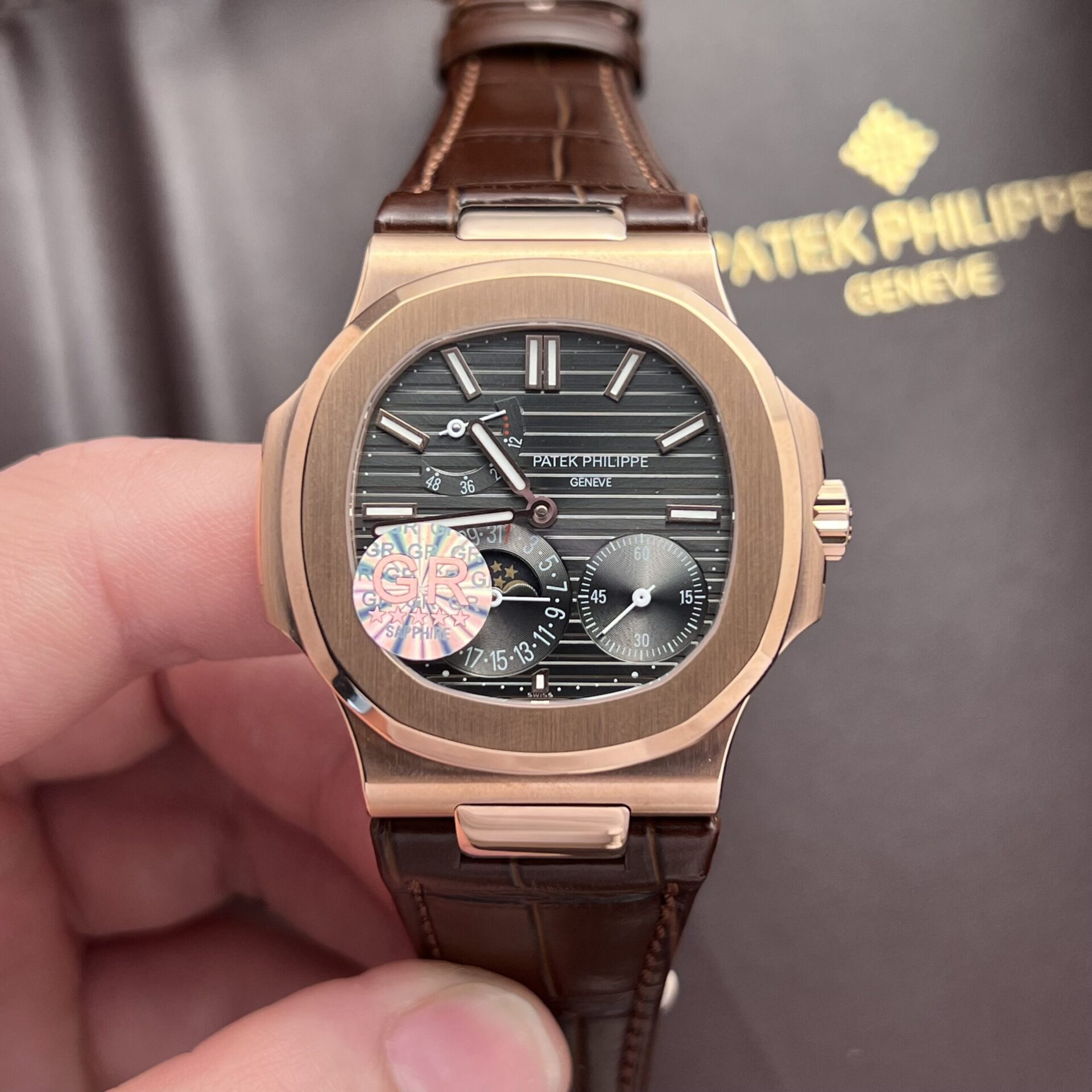 Dong-Ho-Patek-Philippe-Nautilus-5712R-Rep-11-Day-Da-GRF-1-scaled-1.jpg Patek Philippe Replica Watch Nautilus 5712R Brown Leather Strap GR Factory 40mm - Image 1