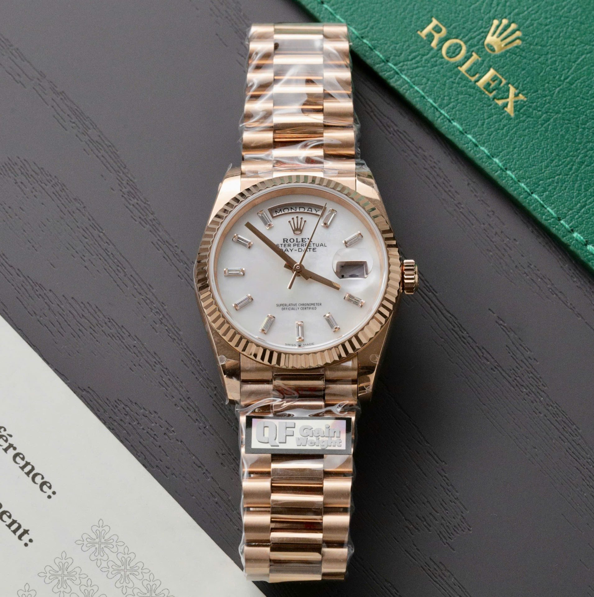Dong-Ho-Rolex-Day-Date-Replica-11-Ma-Vang-Hong-Mat-MOP-Nha-May-QF-36mm-5.jpg Rolex Day-Date Rose Gold Replica Watch Dial Mother Of Pearl QF Factory 36mm - Image 1