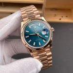 Rolex Day-Date replica luxury watch with a blue-green dial, 18K gold-plated case, VS factory custom edition, 36mm case diameter.