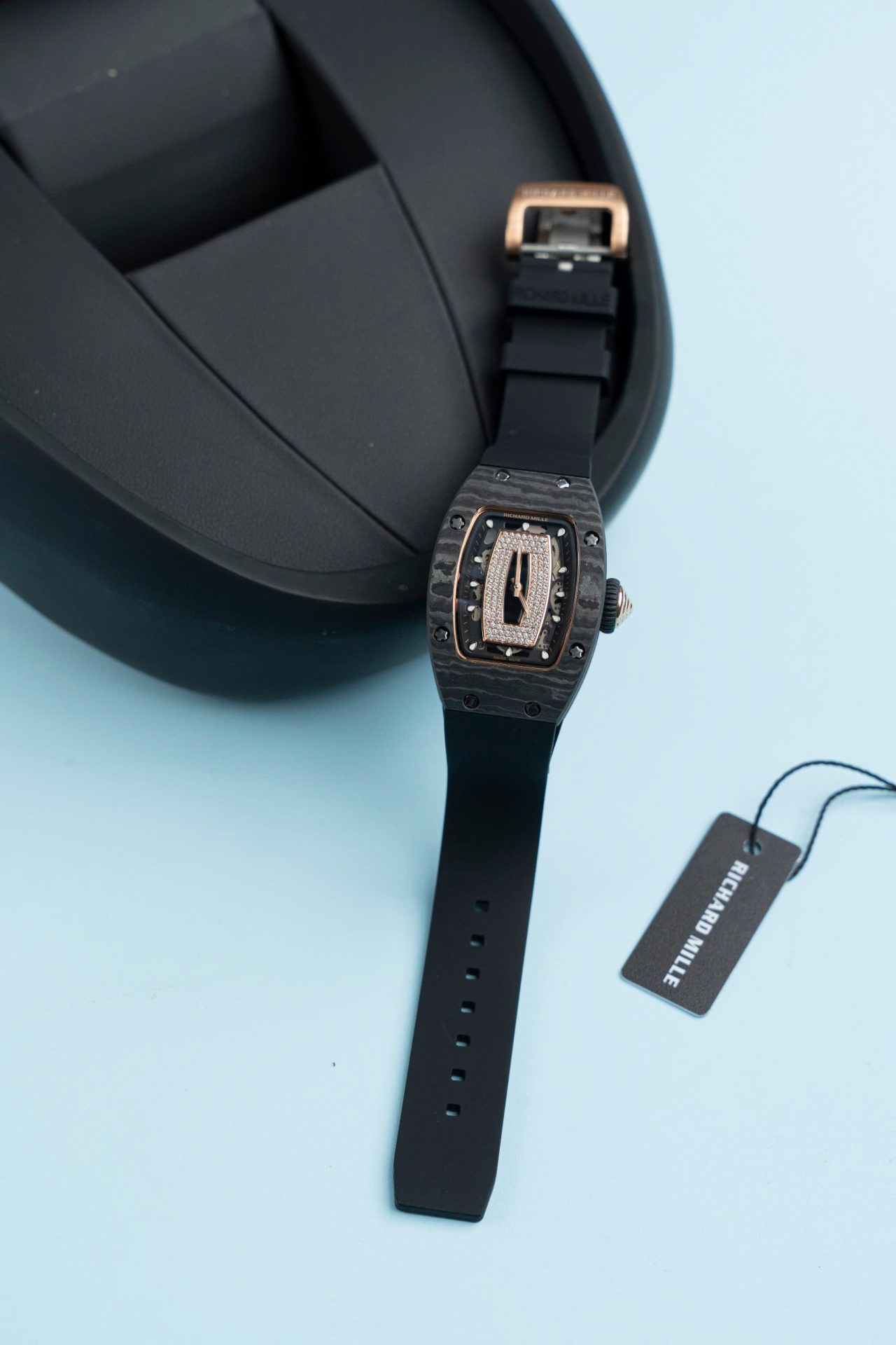 Dong-Ho-Richard-Mille-RM07-01-Fake-11-Vo-Carbon-Day-Cao-Su-Den-36mm-10.jpg Richard Mille RM07-01 Carbon Fake Watch Black Rubber Strap 36mm - Image 1