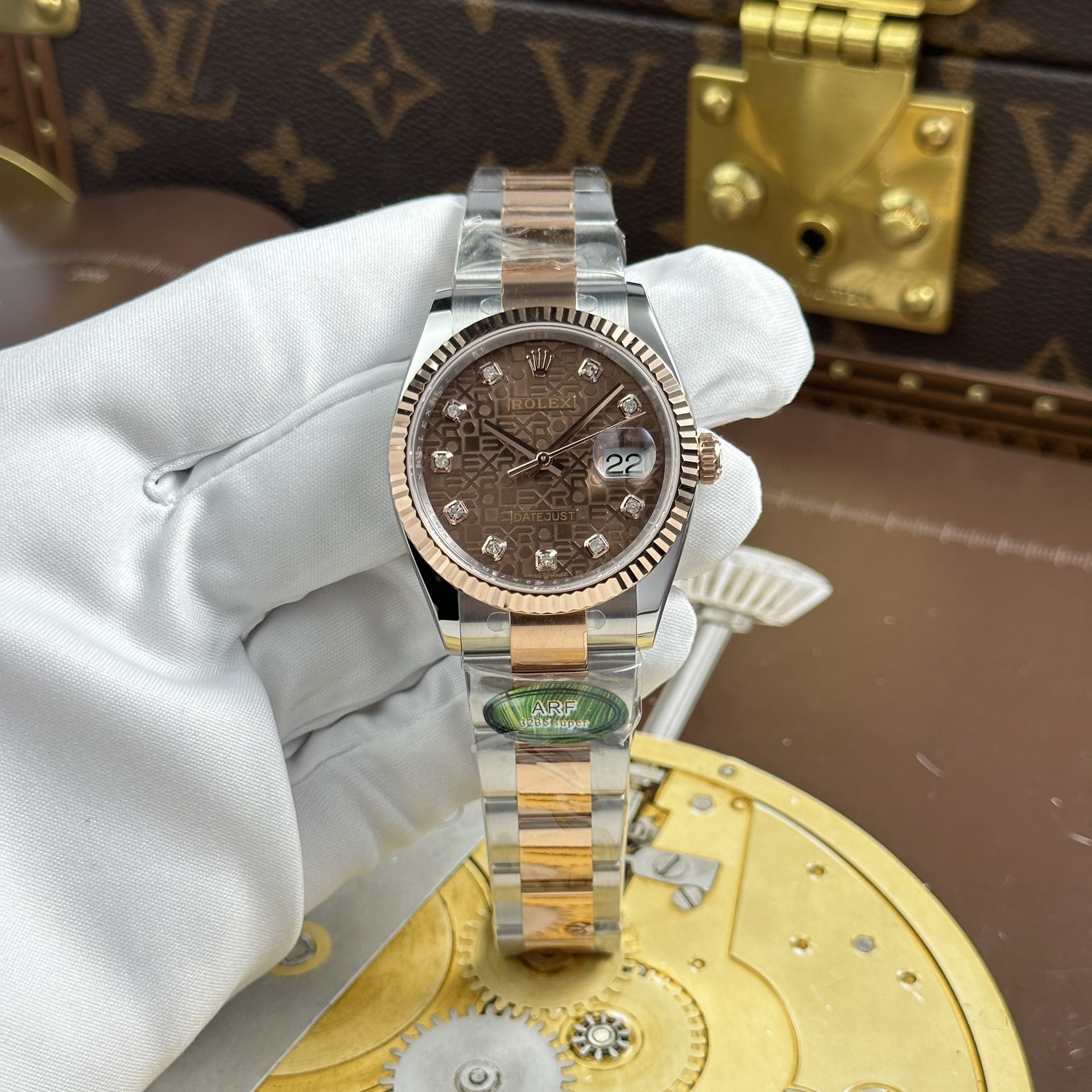 Dong-Ho-Rolex-DateJust-Che-Tac-Mat-Nau-Hoa-Tiet-Vi-Tinh-Day-Oyster-Xuong-AR-36mm-1.jpg Rolex DateJust Fake Watches Brown Dial Oyster Strap AR Factory 36mm - Image 1